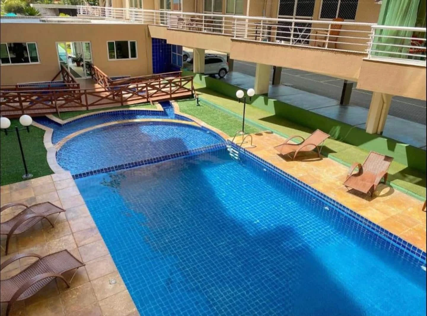 Piscina real do Beach Place, onde fica o apartamento Paradise